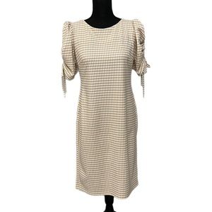 Tan and white houndstooth pattern dress